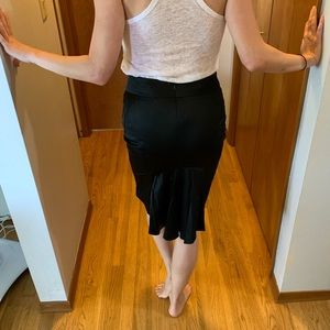 Knee length black skirt